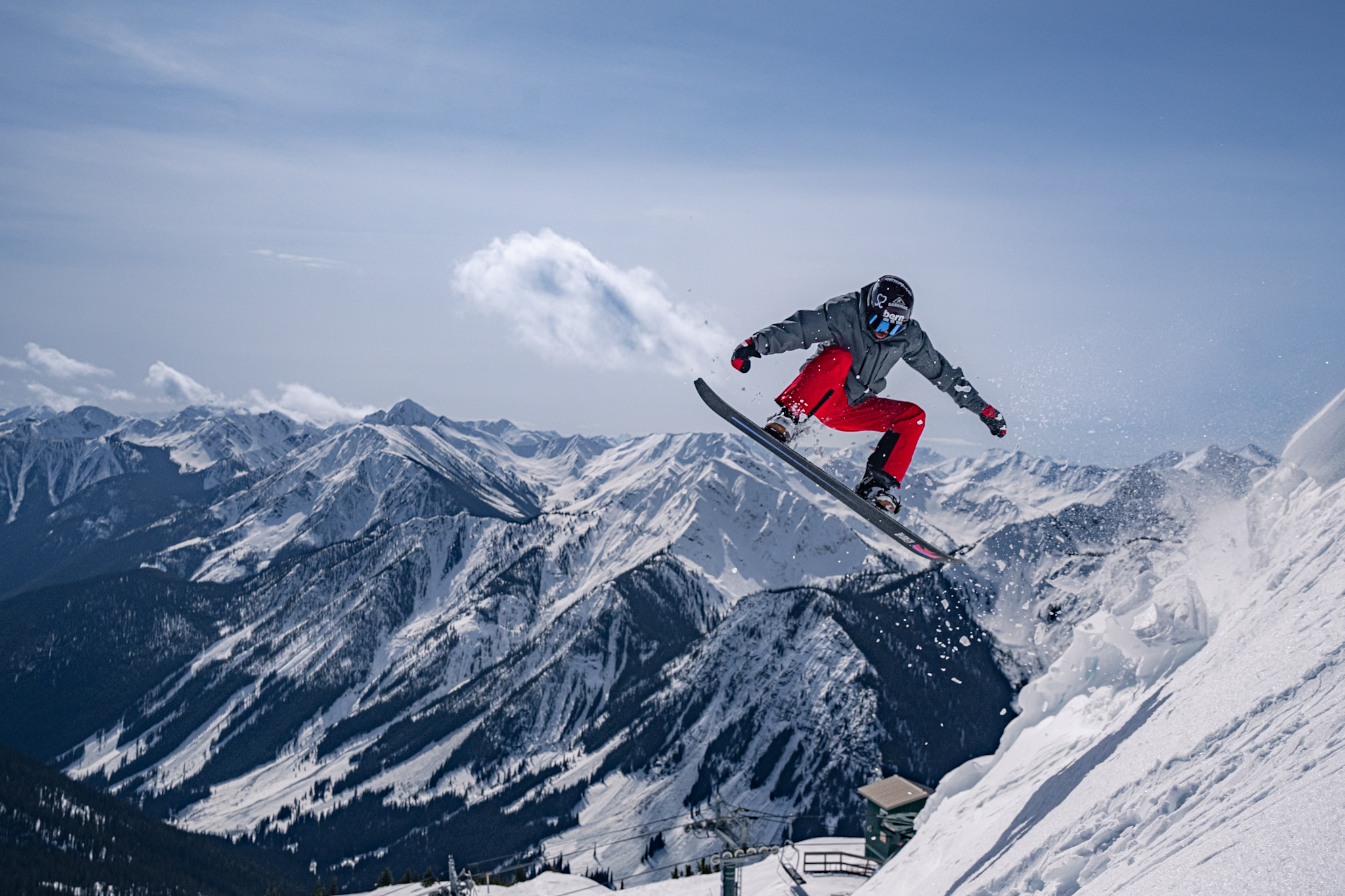 Shredding some pow on a bluebird day at Kicking Horse Mountain Resort