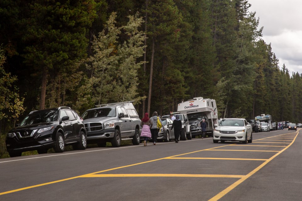 Visitors hunting for parking at Johnson Canyon near Banff, AB
